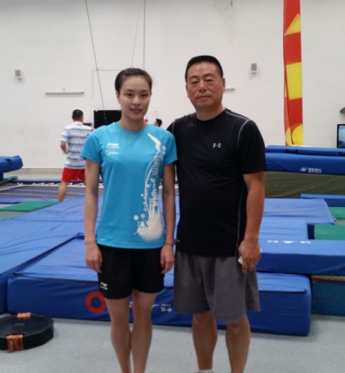 Minxia Wu and Coach Zhihua in China facilities